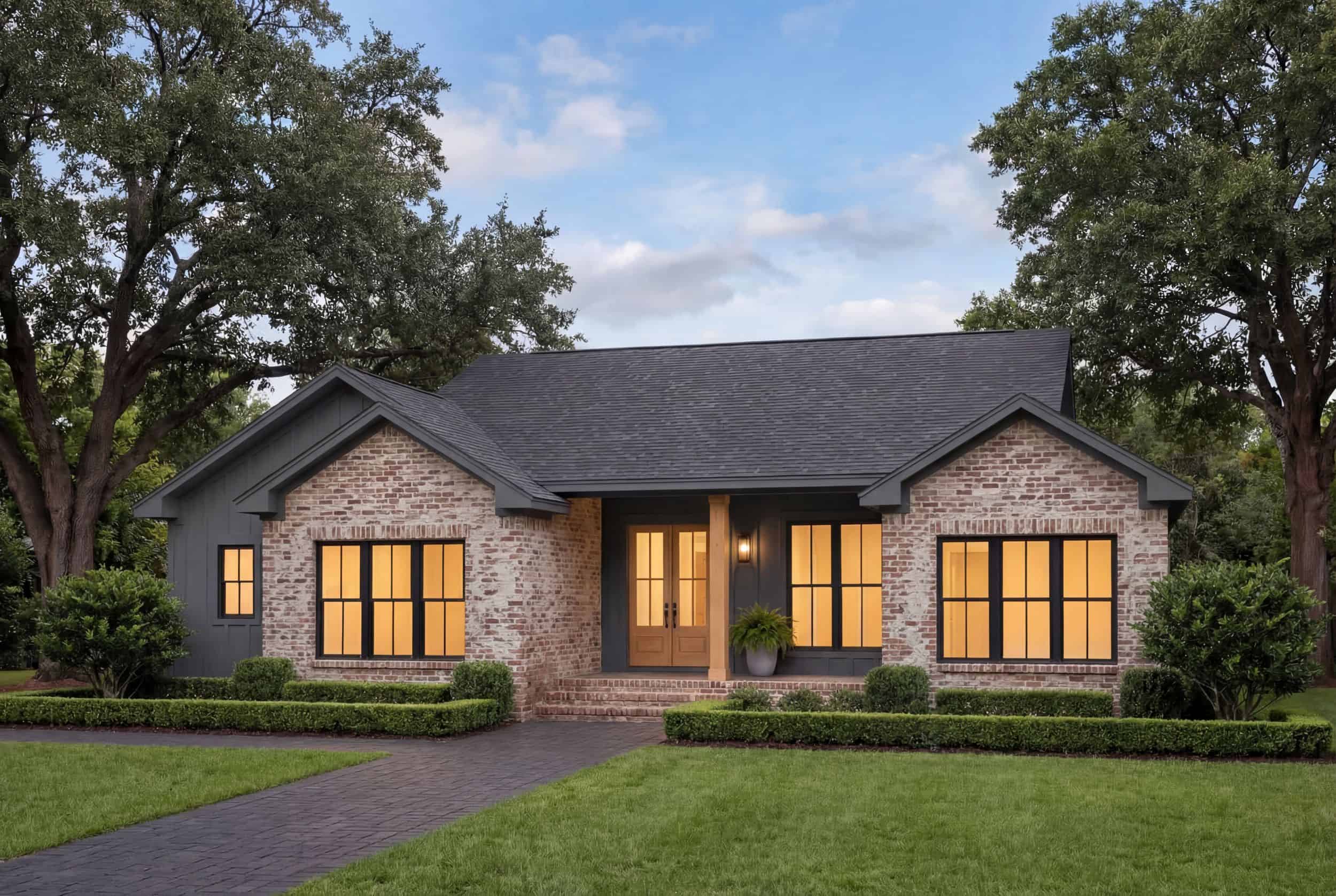 Front elevation of Modern Farmhouse home (ThePlanCollection: House Plan #142-1536)