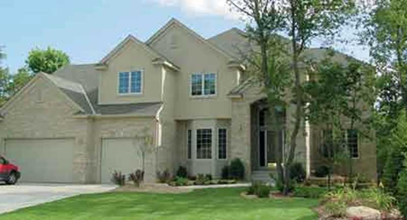 Front view of European home (ThePlanCollection: House Plan #146-2350)