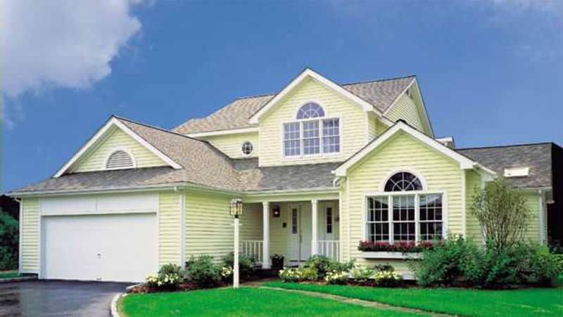 Front view of Country home (ThePlanCollection: House Plan #146-2735)