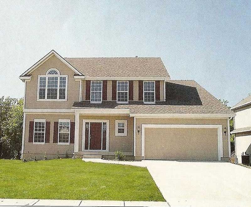 Front elevation photo of Country home (ThePlanCollection: House Plan #147-1131)
