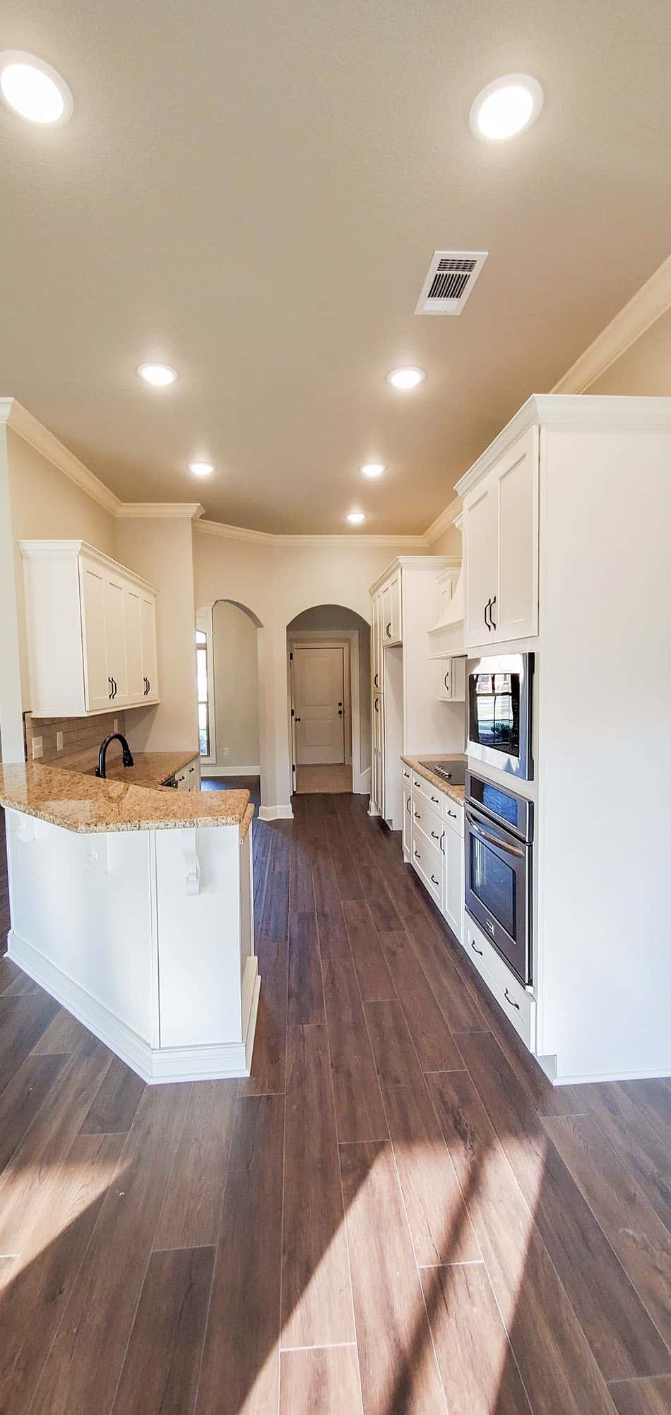 Kitchen: Breakfast Bar of this 4-Bedroom,2094 Sq Ft Plan -153-1053