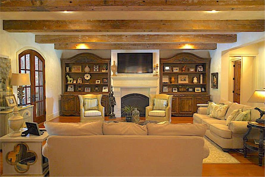 Great Room: Fireplace of this 6-Bedroom,6004 Sq Ft Plan -153-1945