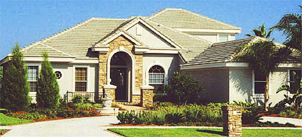 This is a color photo showing the front of this European House Plan.