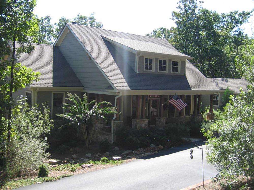 This is a color photo of these Craftsman Home Plans.
