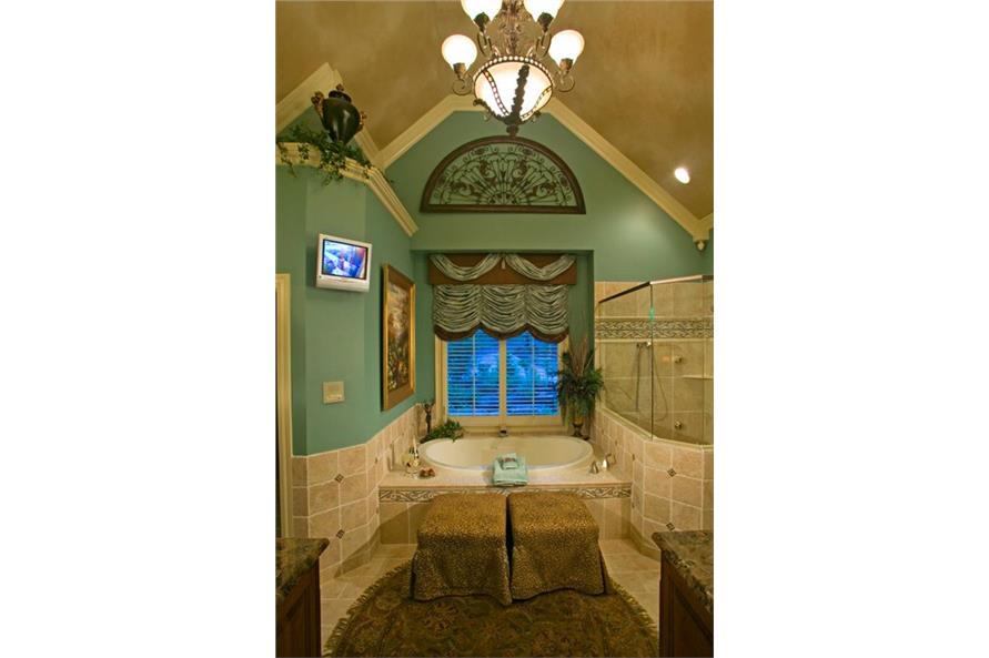 Master Bathroom: Tub of this 5-Bedroom,4225 Sq Ft Plan -163-1052