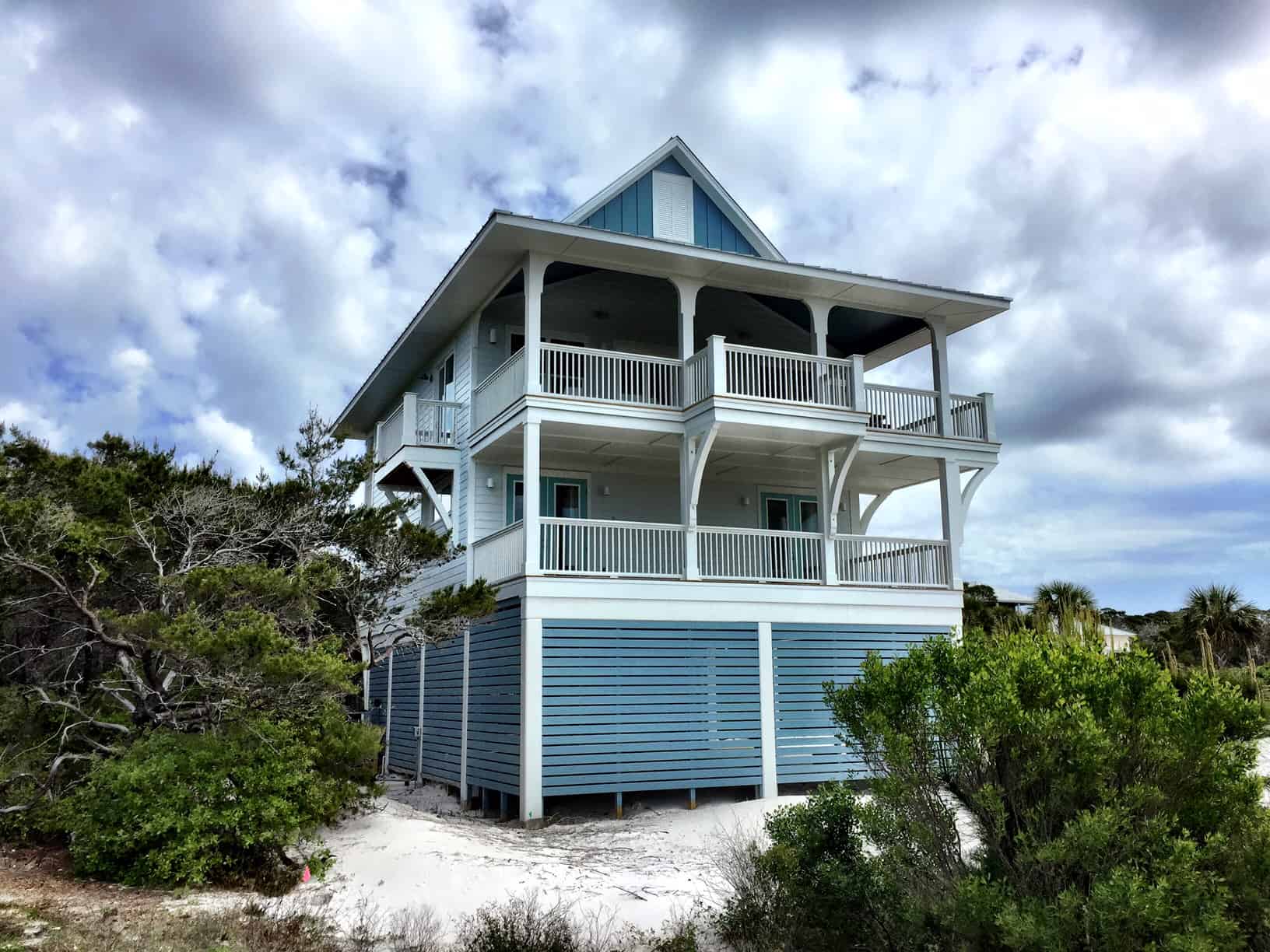 Front elevation of Beach home (ThePlanCollection: House Plan #168-1165)