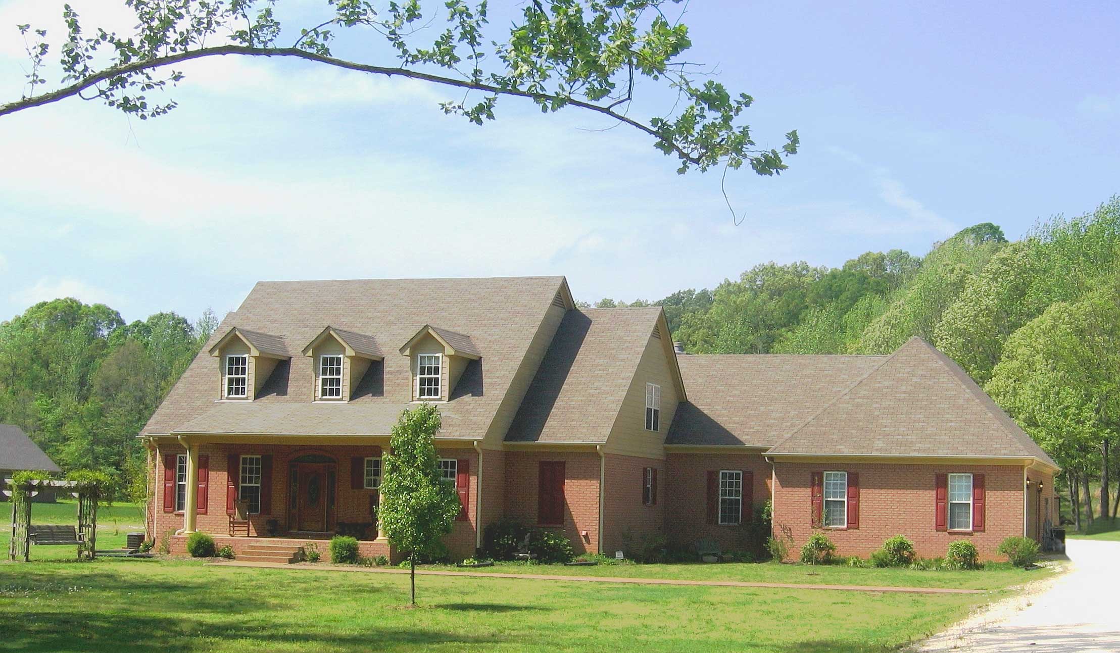 Front view of Luxury home (ThePlanCollection: House Plan #170-1064)