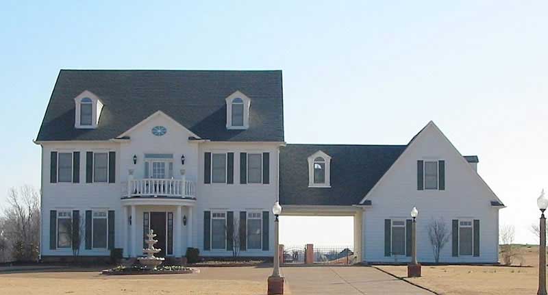 Front view of Colonial home (ThePlanCollection: House Plan #170-1101)