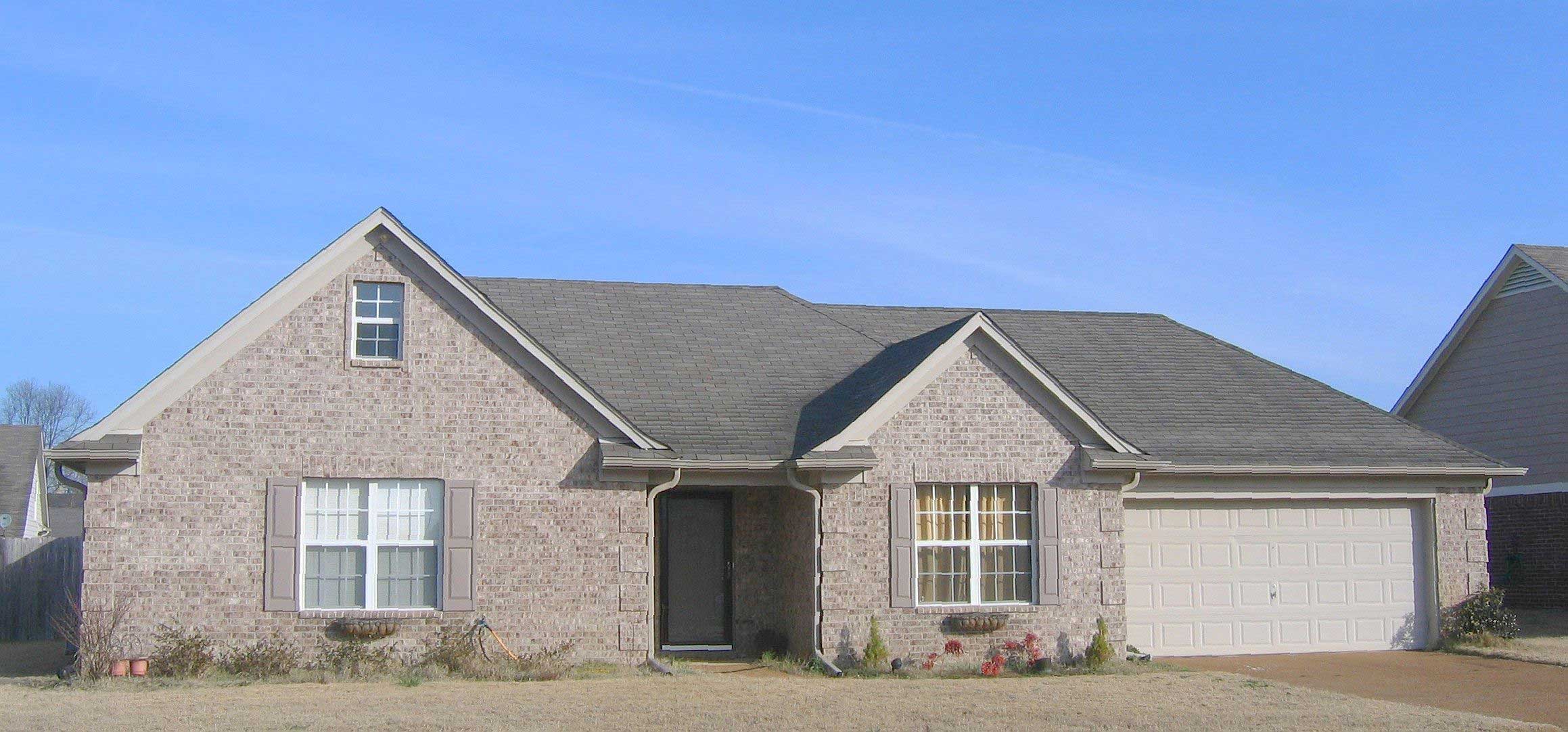 Front view of French home (ThePlanCollection: House Plan #170-1285)