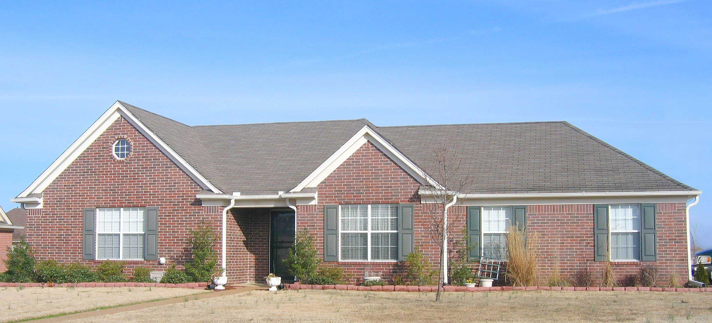 Front view of French home (ThePlanCollection: House Plan #170-1312)
