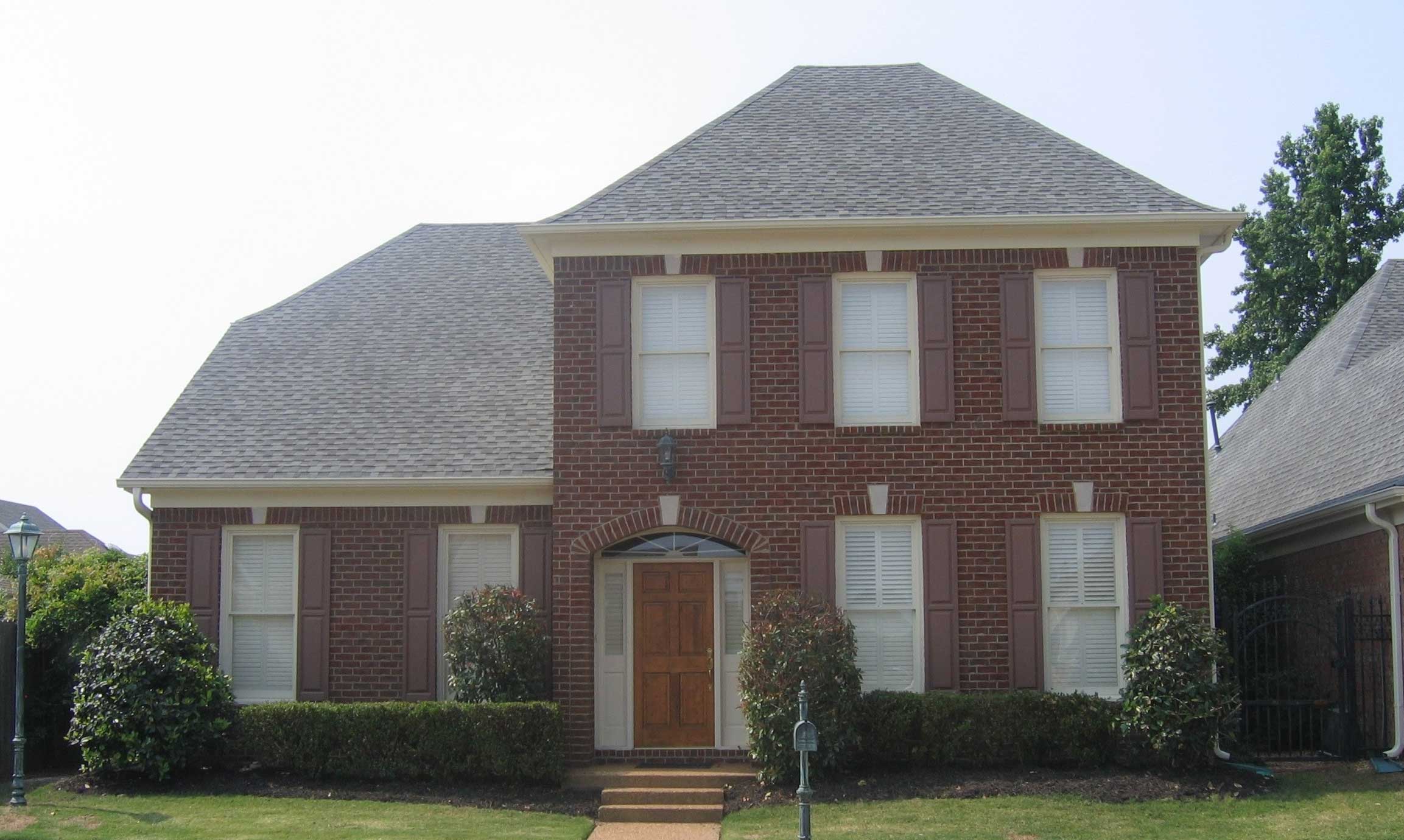 Front view of French home (ThePlanCollection: House Plan #170-1369)