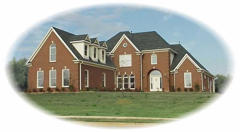 Front view of French home (ThePlanCollection: House Plan #170-2242)