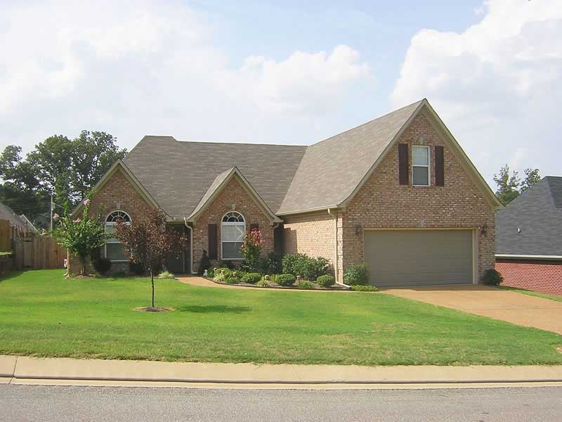 Front view of French home (ThePlanCollection: House Plan #170-2278)