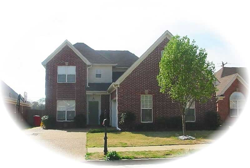 Front view of French home (ThePlanCollection: House Plan #170-2414)