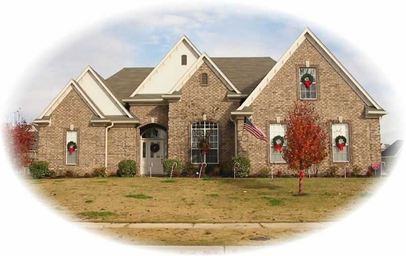 Front view of French home (ThePlanCollection: House Plan #170-2671)