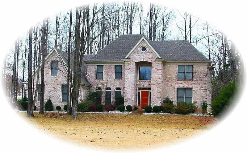 Front view of French home (ThePlanCollection: House Plan #170-2717)