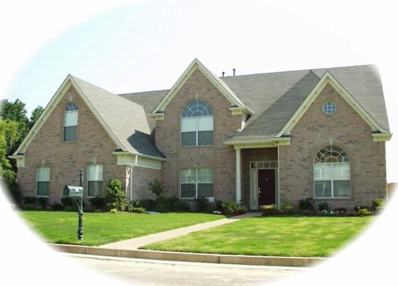 Front view of French home (ThePlanCollection: House Plan #170-2792)