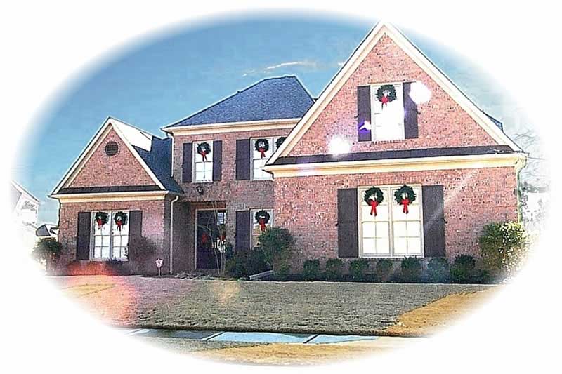 Front view of French home (ThePlanCollection: House Plan #170-3013)