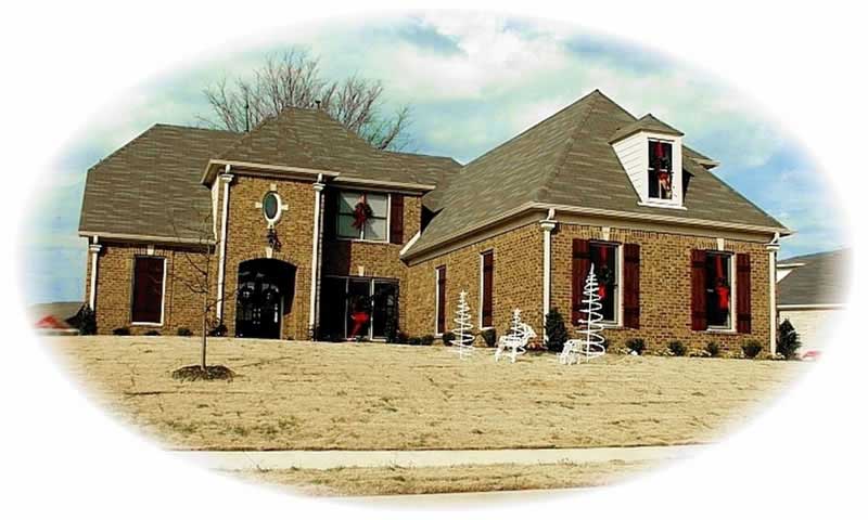 Front view of French home (ThePlanCollection: House Plan #170-3016)