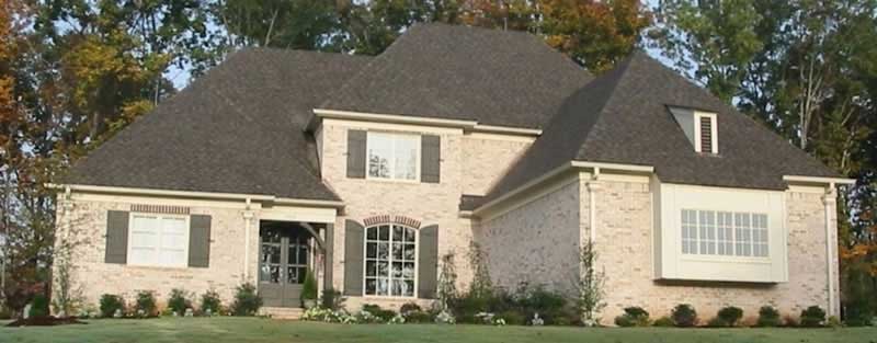 Front view of French home (ThePlanCollection: House Plan #170-3210)