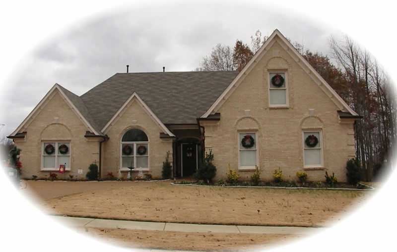 Front view of French home (ThePlanCollection: House Plan #170-3333)