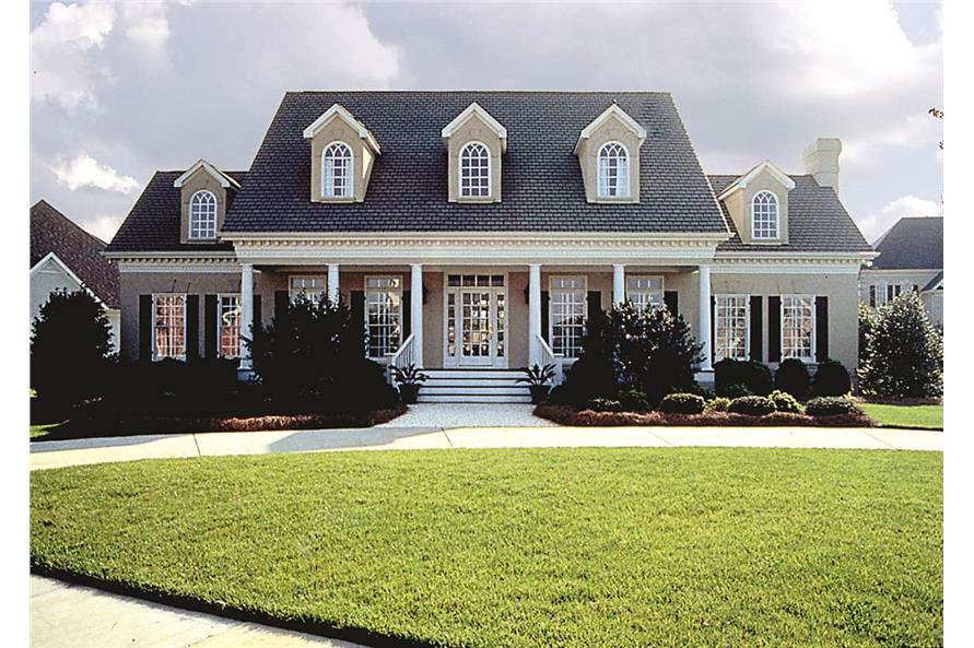 Photo of this classic Southern plantation-style home (ThePlanCollection: House Plan #180-1018)