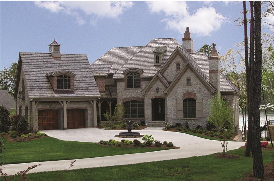 Photo of this luxury manor with European architectural accents. (ThePlanCollection: House Plan #180-1025)