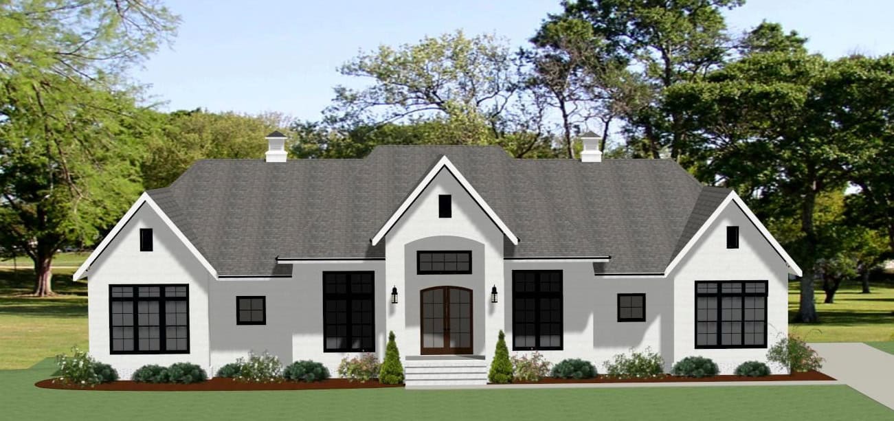 Front elevation of 3,205 sq ft 3-bedroom, 3.5-bath farmhouse style house plan with wraparound porch and gable roof,