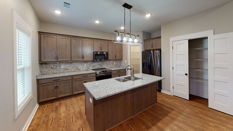 Kitchen: Kitchen Island of this 3-Bedroom,1640 Sq Ft Plan -193-1033