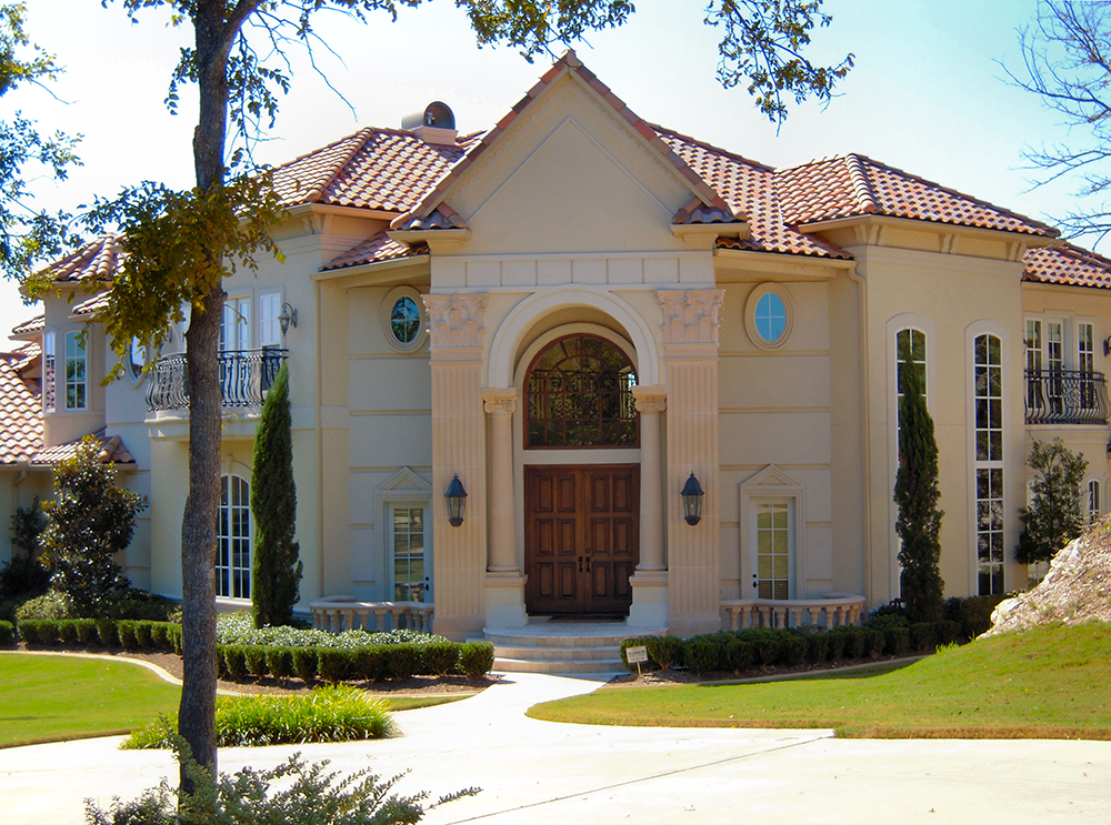 Front elevation of Mediterranean home (ThePlanCollection: House Plan #195-1081)