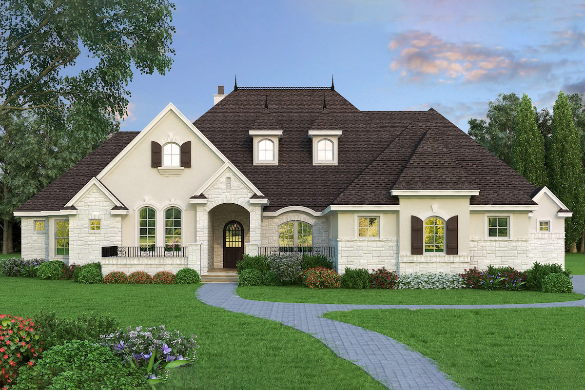 Front elevation of Tudor home (ThePlanCollection: House Plan #195-1210)