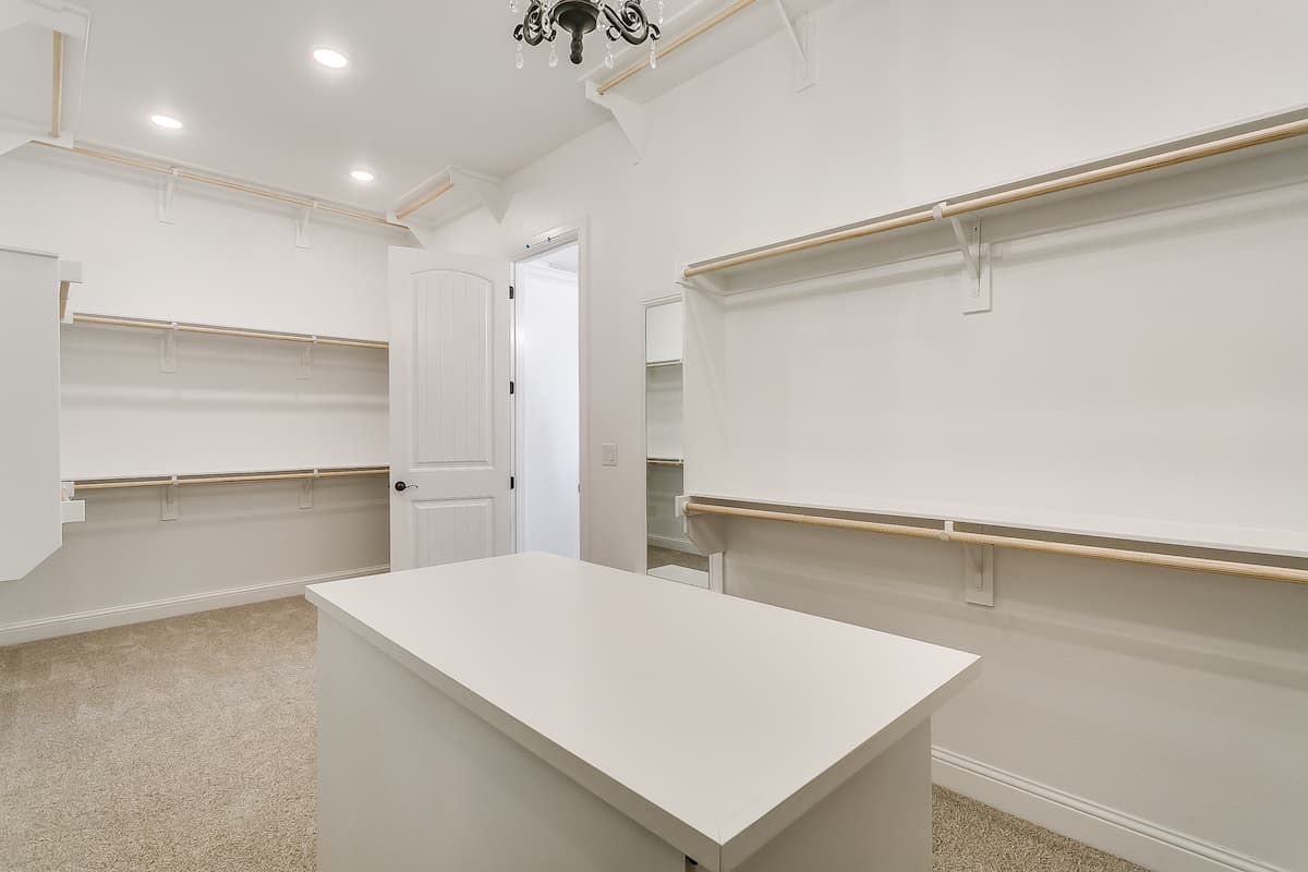 Master Bedroom: Closet of this 4-Bedroom,2765 Sq Ft Plan -206-1048