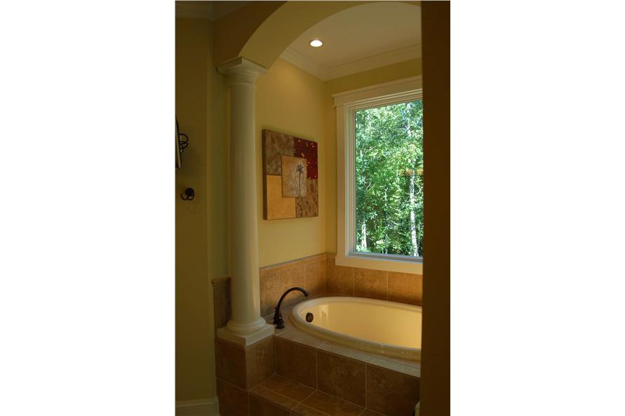 Master Bathroom: Tub of this 4-Bedroom,3277 Sq Ft Plan -213-1009