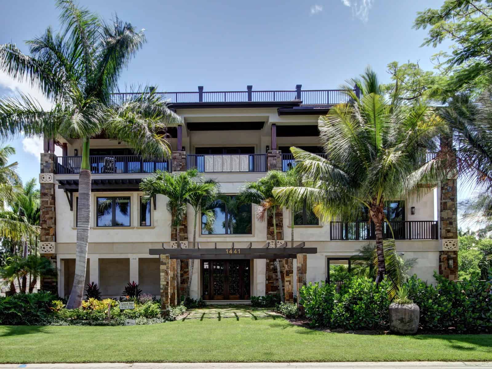 Front elevation of Luxury home (ThePlanCollection: House Plan #219-1021)