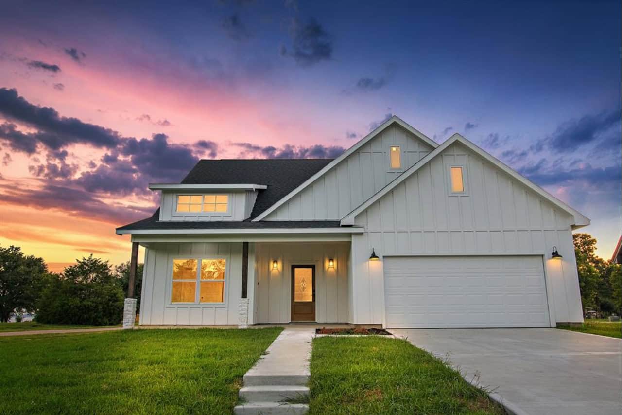 Home at Night of this 3-Bedroom,1625 Sq Ft Plan -223-1016