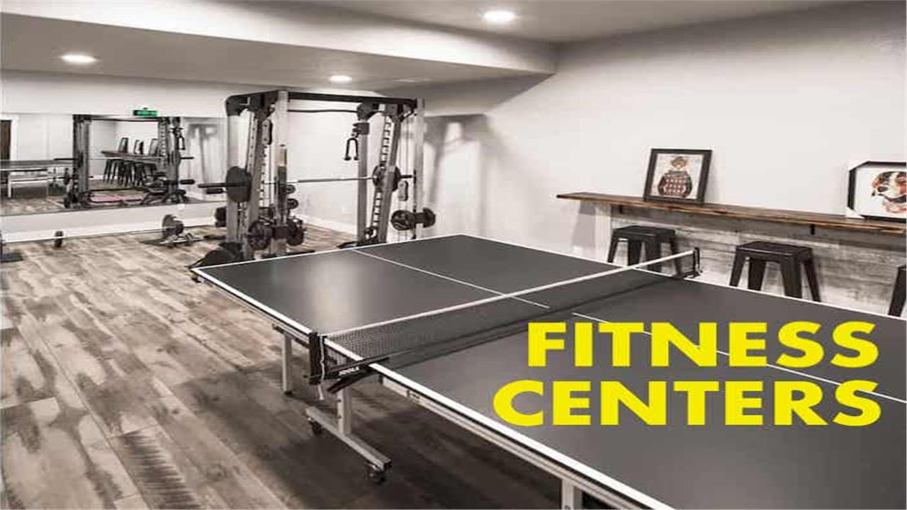 Home gym with exercise equipment and ping-pong table illustrating article about home fitness centers
