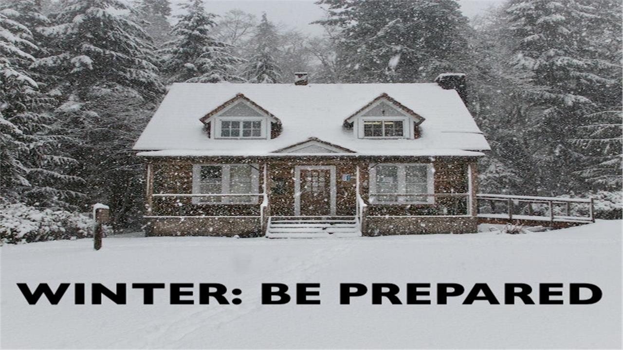 Cape Cod style home covered in snow illustrating article about winter preparedness