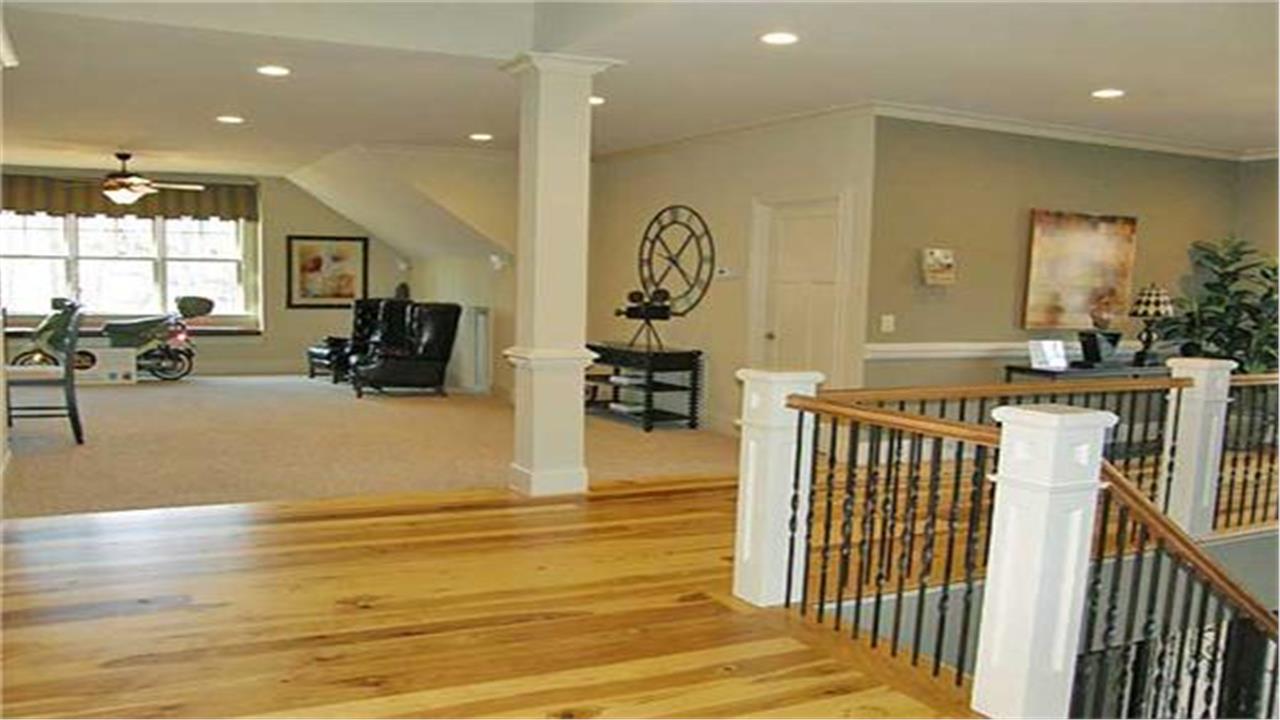 Upstairs in a 6-bedroom Traditional home (#163-1047) illustrating article on the bonus room