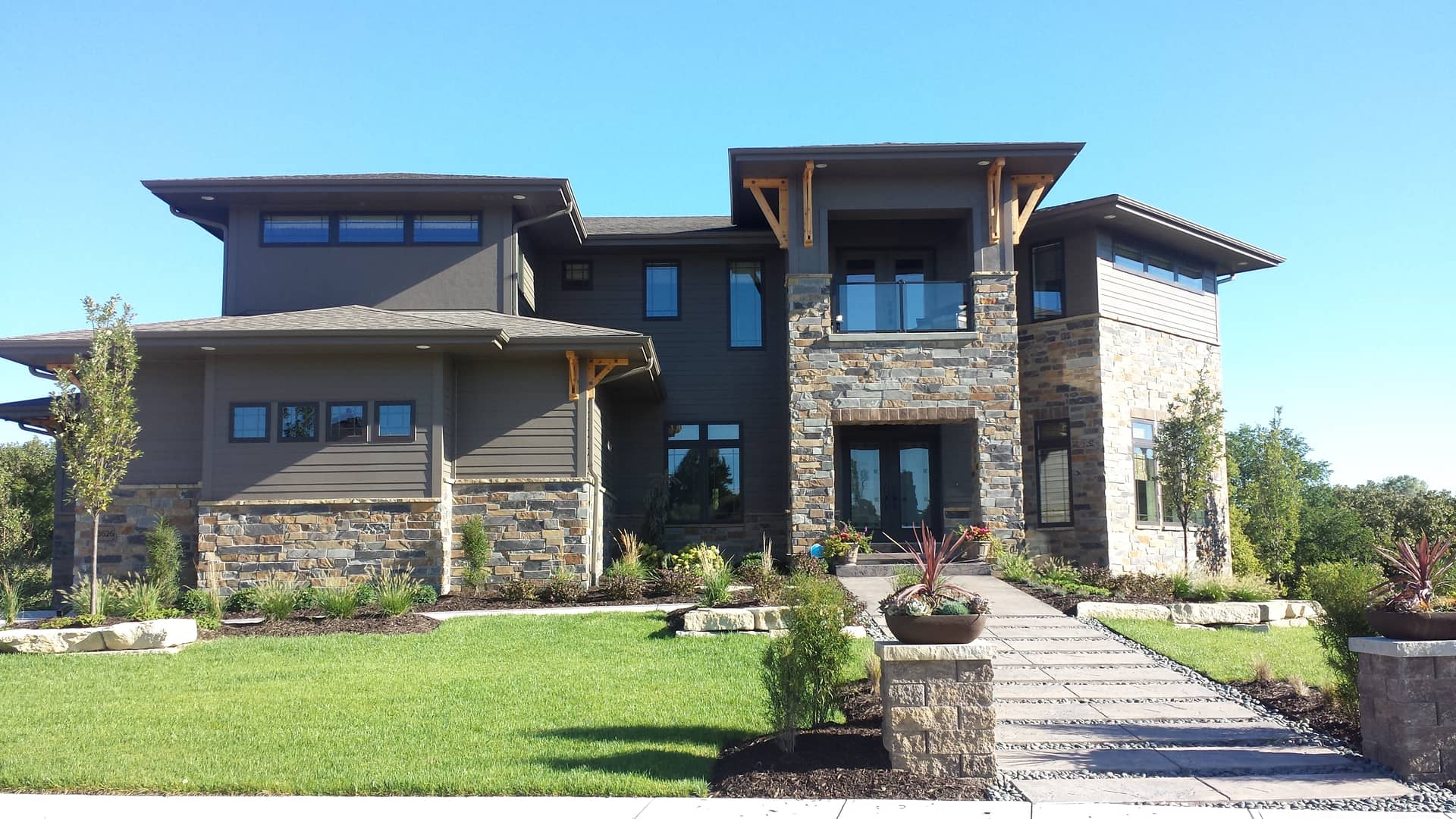 Color photograph of European home plan (ThePlanCollection: House Plan #100-1158)