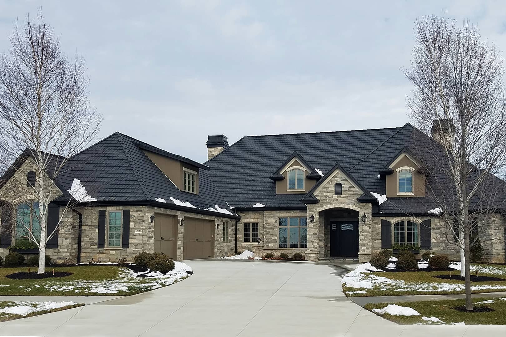 Front elevation of Prairie home (ThePlanCollection: House Plan #100-1228)