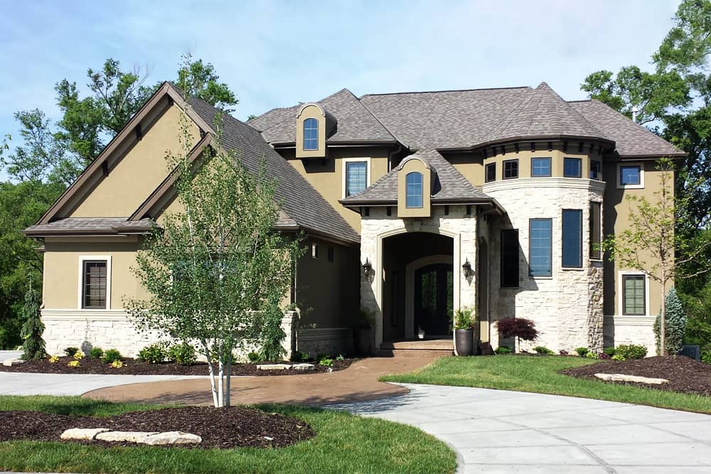 Front elevation of French home (ThePlanCollection: House Plan #100-1280)