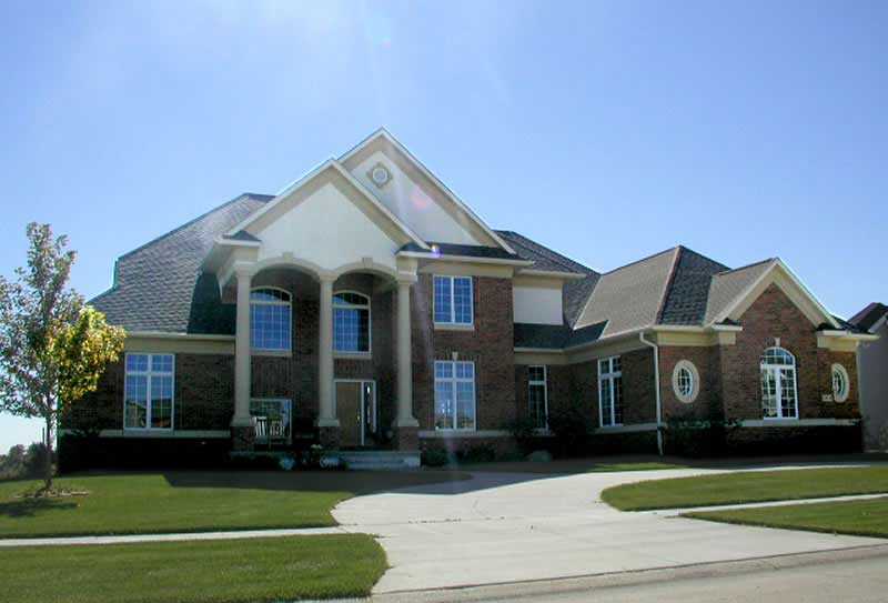 Front elevation of European home (ThePlanCollection: House Plan #101-1646)