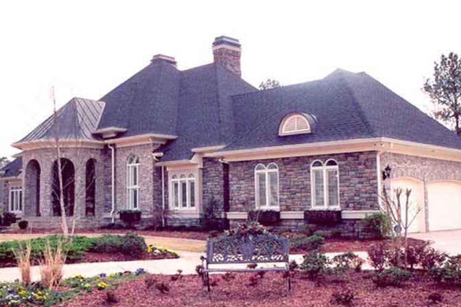 Front elevation of Luxury home (ThePlanCollection: House Plan #106-1165)