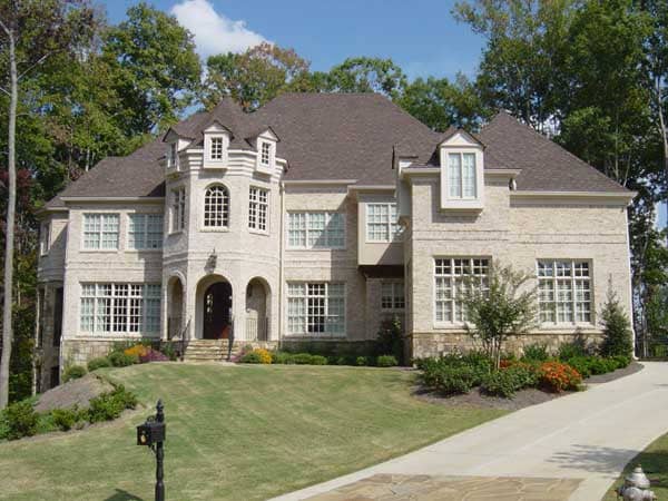 Front elevation of Luxury home (ThePlanCollection: House Plan #106-1173)