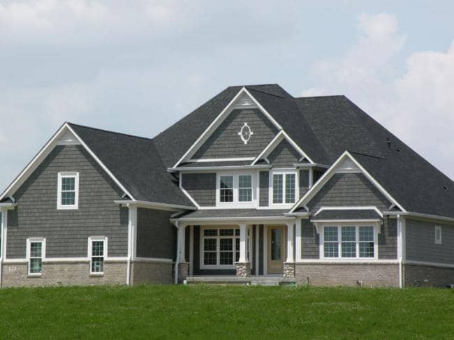 Front elevation of Colonial home (ThePlanCollection: House Plan #106-1175)