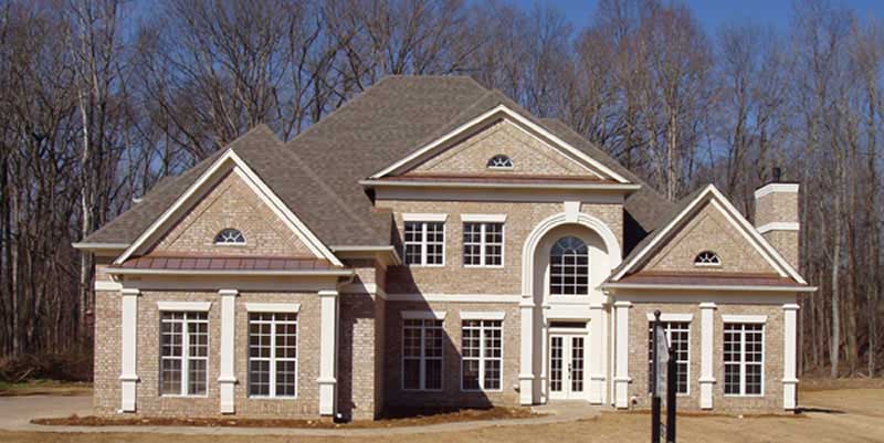 Front elevation of European home (ThePlanCollection: House Plan #106-1177)