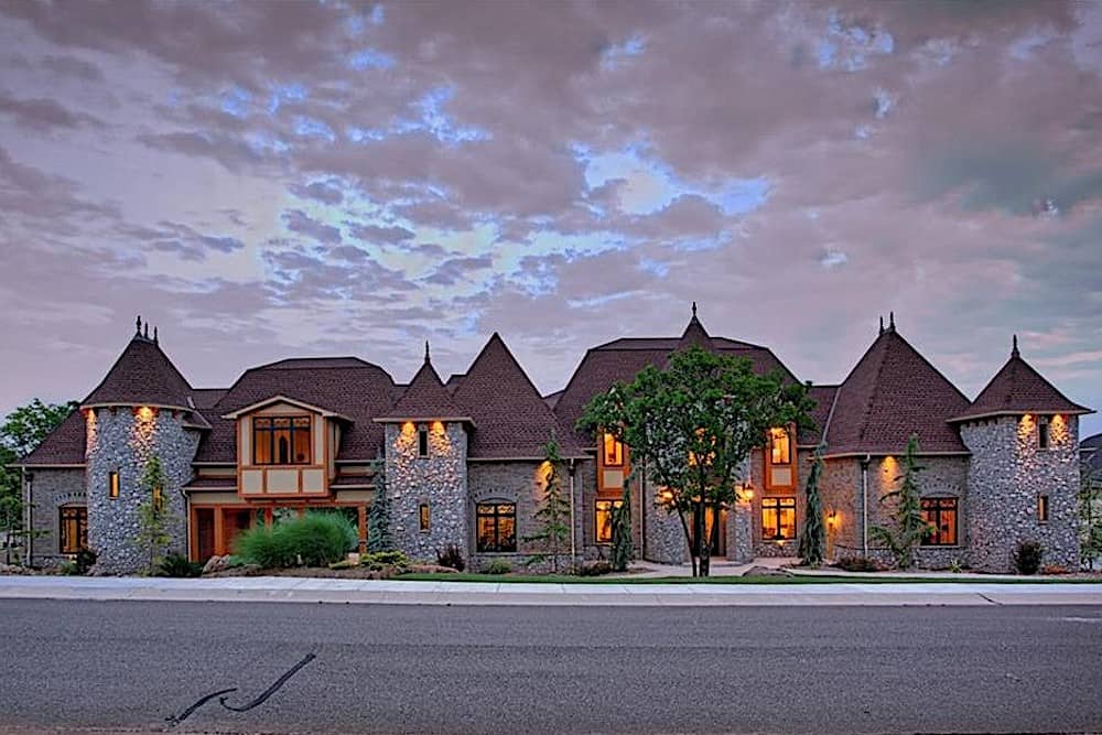 Front elevation of Luxury home (ThePlanCollection: House Plan #106-1295)