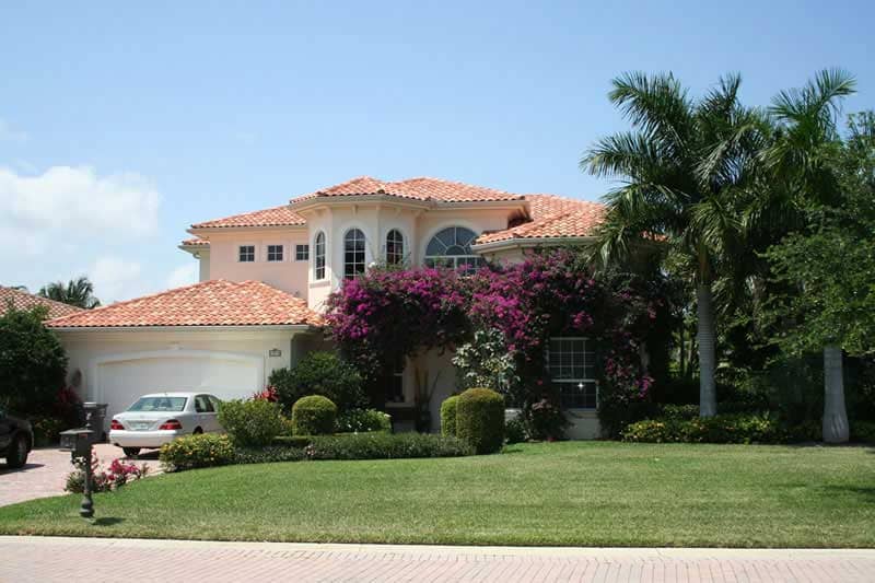 Front elevation of Mediterranean home (ThePlanCollection: House Plan #107-1217)