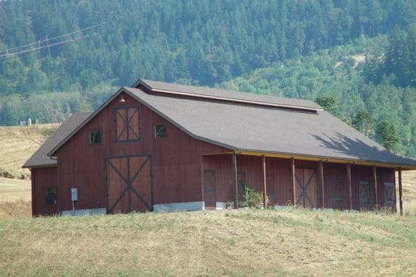 Front elevation of Barn Style home (ThePlanCollection: House Plan #108-1053)