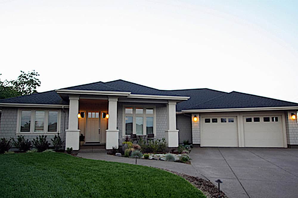 This is the front elevation for these Prairie House Plans.